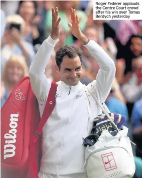  ??  ?? Roger Federer applauds the Centre Court crowd after his win over Tomas Berdych yesterday