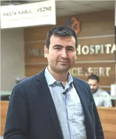  ??  ?? General manager of Clinic Expert, Talip Tastemel, poses after a hair transplant surgery.