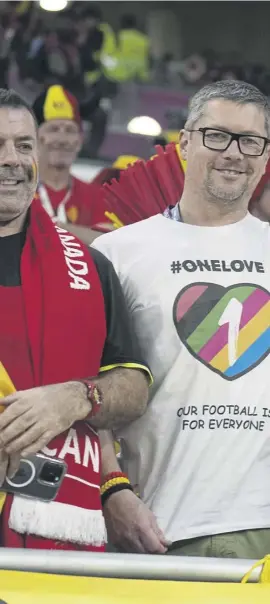  ?? ?? Belgium’s supporters wearing a rainbow jersey ahead of their