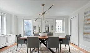  ??  ?? Grey leather chairs and hints of grey in the rug help to make this dining area shine. Inset: Shades of grey make a master bedroom feel calm.