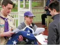  ?? FRAN MAYE – DIGITAL FIRST MEDIA ?? Scouts from Troop 53 take part in a flag-burning ceremony Sunday in Kennett Square.