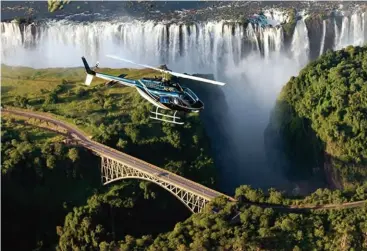 ??  ?? Scenes so lovely ... The mighty Victoria Falls as seen from above.