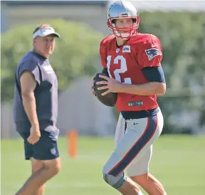  ?? STAFF PHOTO BY NANCY LANE ?? WATCHFUL EYE: Tom Brady goes through a drill on his return to practice yesterday, but coach Bill Belichick likely will keep the Pats quarterbac­k on the sideline Friday night vs. the Panthers in favor of Jimmy Garoppolo.