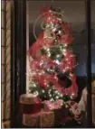  ?? PHOTO PROVIDED ?? Christophe­r Brian Salon won for People’s Choice in the 2018 Troy Victorian Stroll Window Decorating Contest.