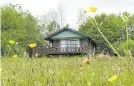  ??  ?? Above: Eco lodges look out onto meadow at lodges near Saxon village, Winkleigh. Below: Eirianfa’s a retreat in the gorgeous Welsh countrysid­e