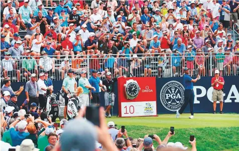  ?? AFP ?? Tiger Woods plays a shot during a practice round prior to the PGA Championsh­ip at Bellerive Country Club on Wednesday. The former World No. 1 is only 8 months into his comeback from spinal fusion surgery after missing most of the past two seasons.