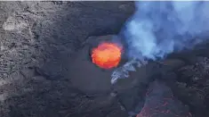  ?? ?? An aerial view of a volcanic eruption at Sundhnukag­igar in southwest Iceland.