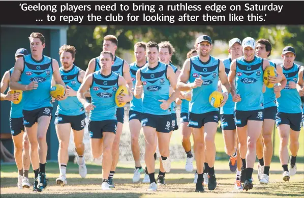  ??  ?? HOT TO TROT: Geelong players lap up the sunshine during a training run at Broadbeach Football Club yesterday. Picture: STEVE HOLLAND