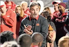  ?? File, Jeremy Stewart / RN-T ?? Rome High head coach John Reid talks to the team after their 59-10 win over Starr’s Mill in the Class 5A state quarterfin­als last Friday.