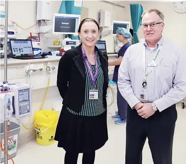  ??  ?? Ms Chere McCamley, one of two new specialist surgeons appointed at the West Gippsland Hospital with Chief Medical Officer Peter Tyre in the hospital’s theatre recovery room.