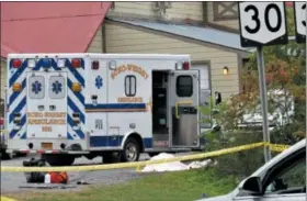  ?? TOM HEFFERNAN SR. VIA AP ?? In this Saturday photo, a body is draped under a blanket at the scene of a fatal crash in Schoharie, N.Y.