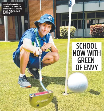  ??  ?? Ignatius Park College student Darcy Keir, 16, on the school's putting green. Picture: ALIX SWEENEY