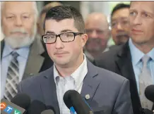  ?? JASON FRANSON/ THE CANADIAN PRESS ?? UCP interim leader Nathan Cooper speaks to media after the first meeting of the party’s caucus on Monday.