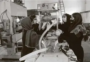  ?? Hamed Sarfarazi / Associated Press ?? Members of Afghanista­n’s prize-winning girls robotics team are working to develop a low-cost ventilator using Toyota car spare parts in an effort to help their country fight the coronaviru­s.