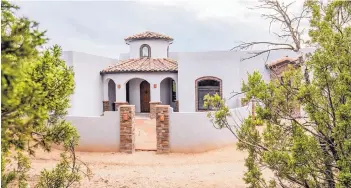  ??  ?? Mediterran­ean red roofing tiles give the Flow Homes entry an interestin­g exterior look. Flow Homes is a featured builder.