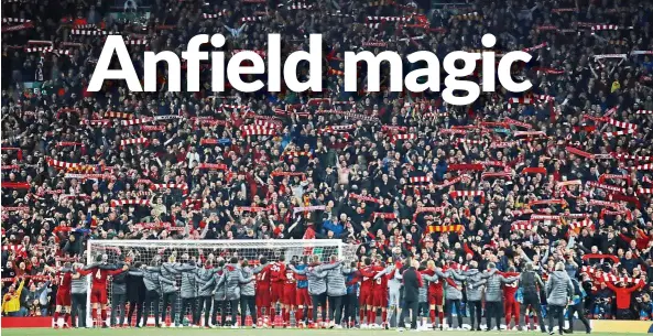  ?? — Reuters ?? We did it!: Liverpool players and staff celebratin­g in front of the Kop end at Anfield after the Champions League semi-final second-leg tie against Barcelona on Tuesday