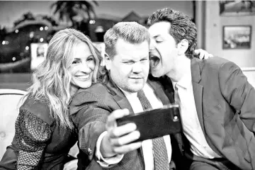  ?? — Courtesy of CBS ?? Julia Roberts and Ben Schwartz (right) chat with Corden during ‘The Late Late Show with James Corden’.