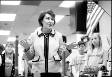  ?? WADE VANDERVORT / STAFF FILE ?? Rep. Jacky Rosen, D-Nev., speaks with Greenspun Junior High School teachers and students from the school’s robotics teams Feb. 23.