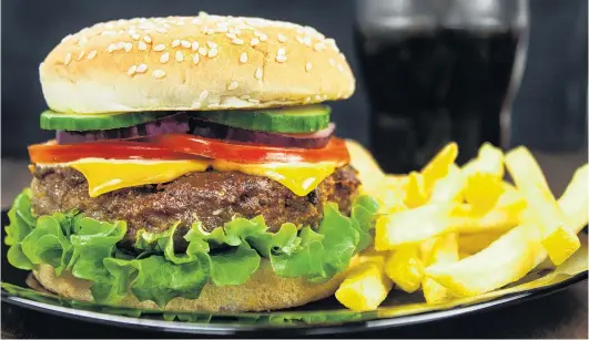  ?? PHOTO: GETTY IMAGES ?? Healthy option . . . Debate about real and meatfree burgers is intensifyi­ng.