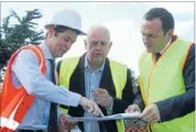  ?? Photo supplied ?? Mayoral approval: Porirua Mayor Nick Leggett looks over plans with Ole’s Nate Winkel and and Dave Wilson.