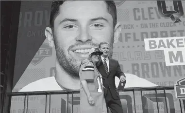  ?? MAX FAULKNER/TRIBUNE NEWS SERVICE ?? The Cleveland Browns selected Oklahoma quarterbac­k Baker Mayfield as the first overall pick in the NFL Draft at AT&T Stadium in Arlington, Texas, on Thursday.