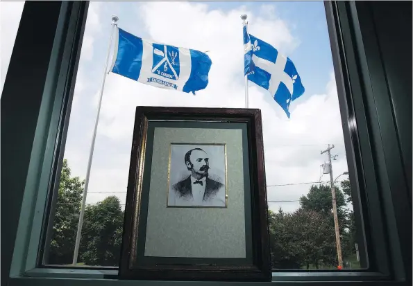  ?? CHRISTINNE MUSCHI FOR THE NATIONAL POST ?? A portrait of Calixa Lavallée in the mayor’s offices in the Montreal suburb of Calixa-lavallée, Que. Lavallée wrote the music to O Canada in 1880.