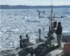  ?? Doug Hamilton ?? New York University Abu Dhabi scientist David Holland monitors the Jakobshavn Glacier in Greenland