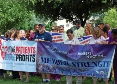  ?? DIGITAL FIRST MEDIA FILE PHOTO ?? A contract agreement has been reached and approved for more than 250 healthcare workers at Pottstown Hospital — Tower Health. In this file photo, SEIU members joined with members of Pottstown Hospital’s nurses union at an August rally to express their concern over new policies and proposals by Tower Health.