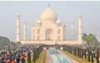  ?? PTI ?? Tourists visit the historic Taj Mahal on a cold and wintry day in Agra on Sunday. —