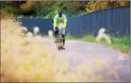  ?? DIGITAL FIRST MEDIA FILE PHOTO ?? A bicyclist takes advantage of the warm weather to take a ride on the Schuylkill River Trail.