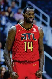  ?? TODD KIRKLAND / ASSOCIATED PRESS ?? Hawks center Dewayne Dedmon used his aggression to produce 20 points and 13 rebounds in Sunday’s home win over the Pistons.