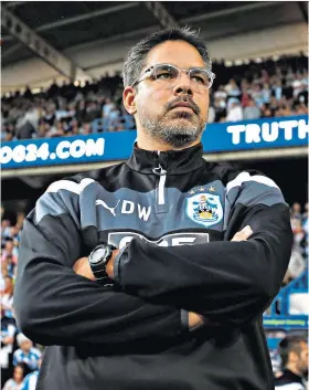 ??  ?? Managing expectatio­ns: David Wagner has overseen two victories from the opening two games with his promoted side