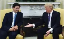  ?? SEAN KILPATRICK, THE CANADIAN PRESS ?? Donald Trump, shown here with Justin Trudeau in February, has shared with Congress a draft list of priorities for NAFTA talks.