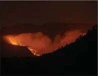  ?? (AP/The Albuquerqu­e Journal/Robert Browman) ?? The Calf Canyon/Hermit Peak Fire burns Saturday south of Las
Vegas, N.M.