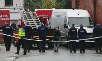  ??  ?? Inquiry: Gardaí at the scene of a shooting in St Laurence’s Terrace in Bray