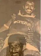  ??  ?? Singh rides high on the shoulders of Nadi midfielder Aiyub Bai during the victory lap in 1986