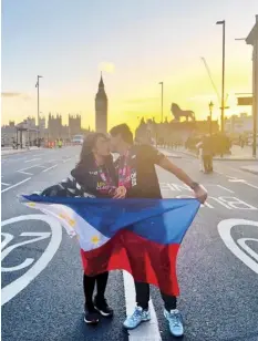  ?? CONTRIBUTE­D PHOTOS ?? Afshin Ghassemi and his wife Hana sealed their milestone achievemen­t finishing the London Marathon together with a kiss against the backdrop of the famous Big Ben with the rising sun on the horizon, as if drawing applause from the heavens above.