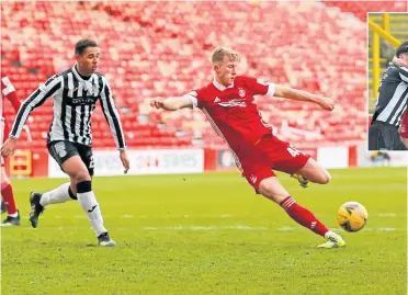  ??  ?? Aberdeen defender Ross Mccrorie takes a shot at goal but fails to break the deadlock