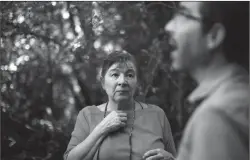  ?? Canadian Press photo ?? Cowichan Tribes Land Developmen­t staff Dianne Hinkley looks on as UVic anthropolo­gist Brian Thom talks about the area during a cultural tour of the ancestral lands of Ye'yumnuts in Duncan, B.C., on Thursday.