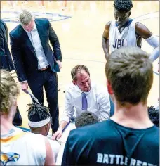  ?? Photo courtesy of JBU Sports Informatio­n ?? John Brown head basketball coach Jason Beschta announced the signing of five new players for the 2018-19 basketball season.