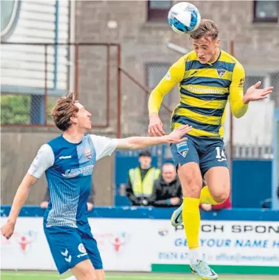  ?? ?? Lewis McCann rises high to make it 1-0 for Dunfermlin­e at Montrose