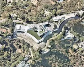  ?? NearMap ?? THE EIGHT-ACRE estate centers on a 100,000-square-foot home with five pools and other lavish amenities. Developer Nile Niami hoped to sell it for $500 million.