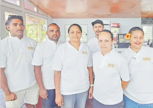  ?? Picture: SOPHIE RALULU ?? Staff and management of Chicken and Ice Cream Shack in Navua.