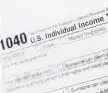  ??  ?? The upcoming tax filing season will be unique due to rampant unemployme­nt, working from home and general upheaval due to COVID-19 MARKLENNIH­AN/ AP2018