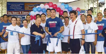  ??  ?? San Juan City Rep. Ronnie Zamora, Vice Mayor Francis Zamora, City Councilors and Blackwater Elite players headed by coach Leo Isaac at the blessing and ribbon-cutting of the basketball court of Brgy. Pedro Cruz. An exhibition game between the team San...