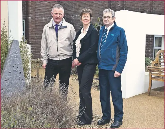  ??  ?? Chairman of the Tralee Branch of Hospice Foundation, Dan Galvin, Maura Sullivan and Chairman of the Kerry Hospice Foundation, Ted Moynihan in the Garden of the Palliative care unit of Kerry General Hospital.