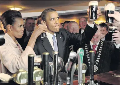  ??  ?? ABOVE: US President Barack Obama and his wife Michelle enjoying the Irish pub experience. BELOW: A recently released infographi­c about the drinks industry in Wexford.