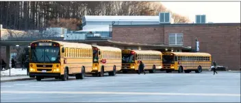  ?? GARY FOURNIER — SENTINEL & ENTERPRISE ?? School buses drop off students at Montachuse­tt Regional Technical School on Thursday, Feb. 2, 2023.