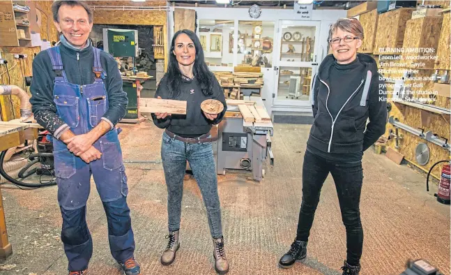  ?? ?? BURNING AMBITION: From left, woodworker Jim Brown, Gayle Ritchie with her bowl and plaque and pyrographe­r Gail Duncan at the studio in Kincaple, St Andrews.