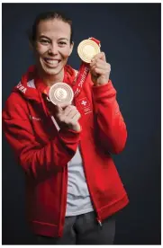  ?? ?? Michelle Gisin. De nouveau l’or du combiné et du bronze en prime pour cette polyvalent­e souriante.